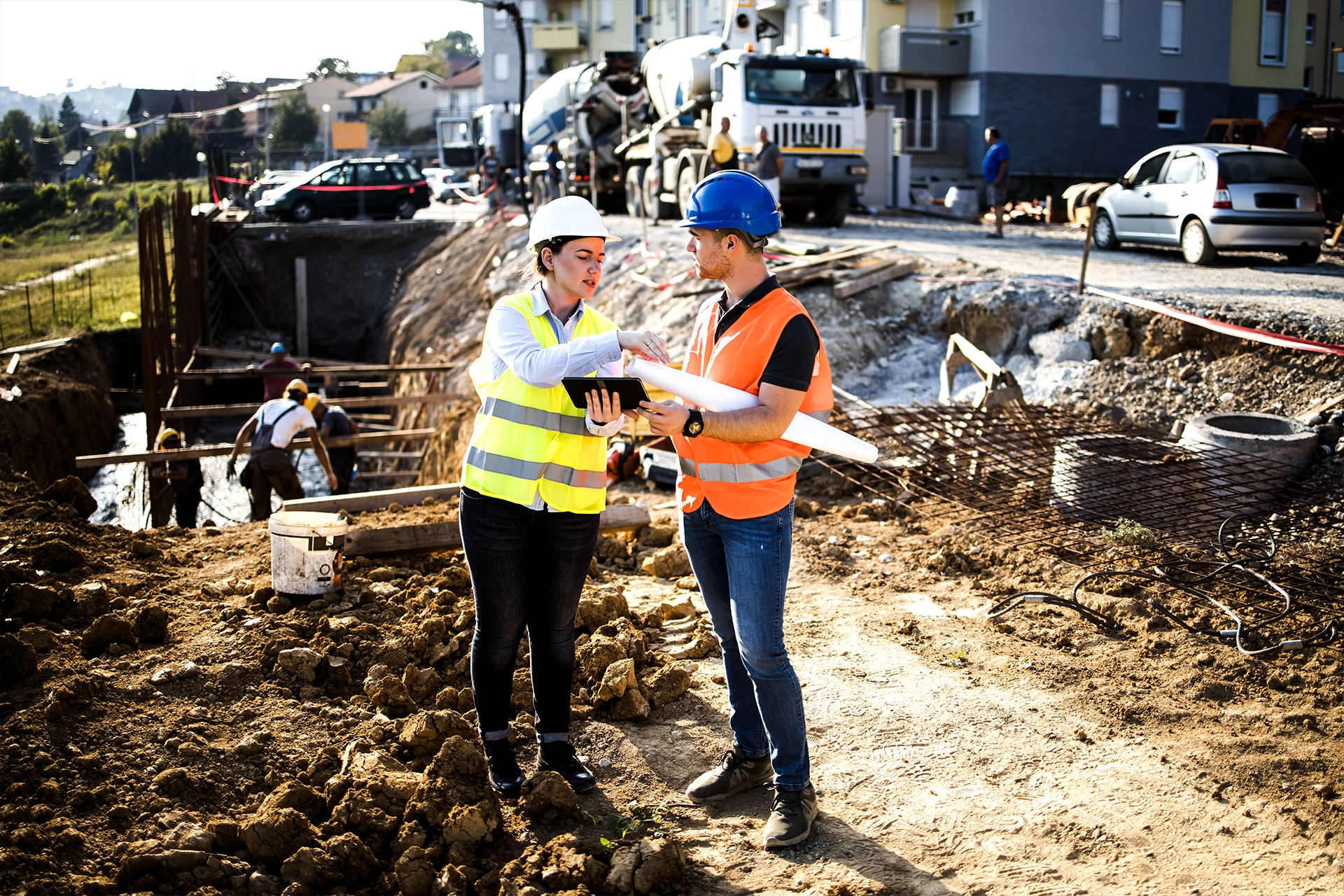 Construction supervisor overseeing work at site